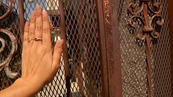 Movie still from “Creep 2” (2017), directed by Patrick Brice – A woman's hand with a wedding ring on her left hand; Extreme Close Up shot, Overhead angle