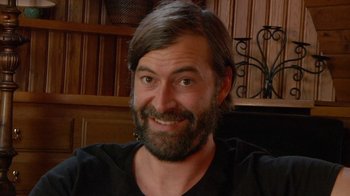 Movie still from “Creep 2” (2017), directed by Patrick Brice – A person with a beard; Close Up shot, High angle