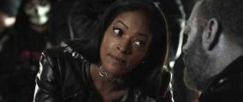 Movie still from “Z Nation” (2014), created by Karl Schaefer – A person wearing a leather jacket; Close Up shot, Over the shoulder angle