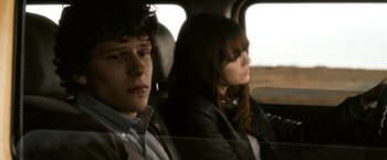 Movie still from “Zombieland” (2009), directed by Ruben Fleischer – A man and a woman sitting in the back of a car; Close Up shot, Over the shoulder angle