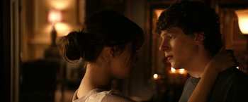 Movie still from “Zombieland” (2009), directed by Ruben Fleischer – A woman standing next to a man in front of a mirror; Close Up shot, Over the shoulder angle