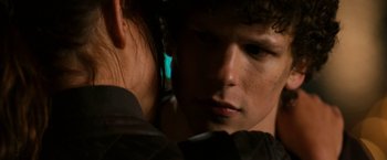 Movie still from “Zombieland” (2009), directed by Ruben Fleischer – A person's face in the dark; Close Up shot, Over the shoulder angle