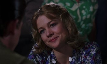 Movie still from “10 Rillington Place” (1971), directed by Richard Fleischer – A person wearing a floral shirt; Close Up shot, Over the shoulder angle