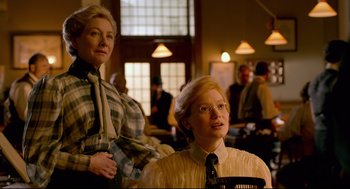 Movie still from “Crimson Peak” (2015), directed by Guillermo del Toro – Two women sitting next to each other in a room; Medium shot, Low angle