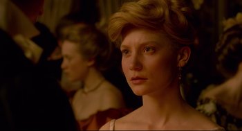 Movie still from “Crimson Peak” (2015), directed by Guillermo del Toro – A woman in a white dress and a man in a black suit; Close Up shot, Over the shoulder angle