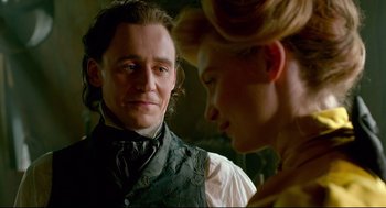 Movie still from “Crimson Peak” (2015), directed by Guillermo del Toro – A man and a woman looking at one another; Close Up shot, Over the shoulder angle