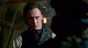 Movie still from “Crimson Peak” (2015), directed by Guillermo del Toro – A person with long hair; Close Up shot, Over the shoulder angle