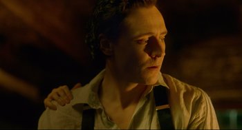 Movie still from “Crimson Peak” (2015), directed by Guillermo del Toro – A person with a tie; Close Up shot, Over the shoulder angle