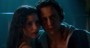 Movie still from “Crimson Peak” (2015), directed by Guillermo del Toro – A man and a woman pose for a picture; Close Up shot, Low angle