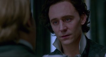 Movie still from “Crimson Peak” (2015), directed by Guillermo del Toro – A person looking at a camera; Close Up shot, Over the shoulder angle