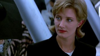 Movie still from “101 Dalmatians” (1996), directed by Stephen Herek – A person wearing a jacket; Close Up shot, Over the shoulder angle