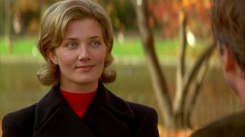 Movie still from “101 Dalmatians” (1996), directed by Stephen Herek – A person wearing a jacket; Close Up shot, Over the shoulder angle