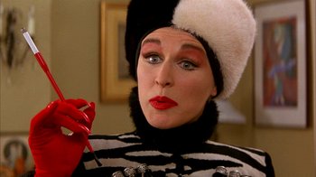 Movie still from “101 Dalmatians” (1996), directed by Stephen Herek – A person wearing a hat; Close Up shot, Over the shoulder angle