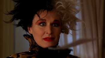 Movie still from “101 Dalmatians” (1996), directed by Stephen Herek – A person wearing a wig; Close Up shot, Low angle