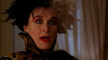 Movie still from “101 Dalmatians” (1996), directed by Stephen Herek – A person wearing a wig; Close Up shot, Low angle