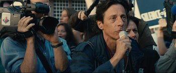 Movie still from “120 BPM” (2017), directed by Robin Campillo – A group of people standing next to each other on a street; Close Up shot, Low angle