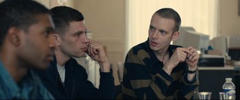 Movie still from “120 BPM” (2017), directed by Robin Campillo – Two young men sitting in front of each other talking; Medium shot, Over the shoulder angle
