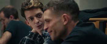 Movie still from “120 BPM” (2017), directed by Robin Campillo – Two young men sitting next to each other in a room; Close Up shot, Over the shoulder angle