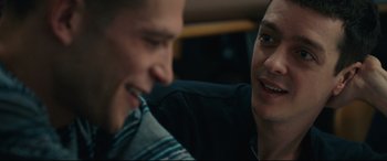 Movie still from “120 BPM” (2017), directed by Robin Campillo – Two young men sitting next to each other on a couch; Close Up shot, Over the shoulder angle