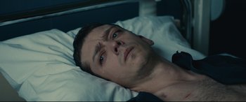 Movie still from “120 BPM” (2017), directed by Robin Campillo – A person laying in a bed; Close Up shot, High angle