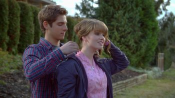 Movie still from “16 Wishes” (2010), directed by Peter DeLuise – A young man and a young woman standing next to each other; Close Up shot, Over the shoulder angle