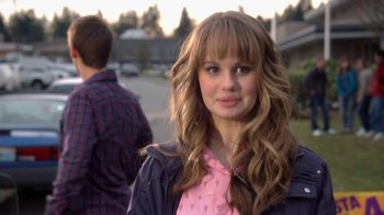 Movie still from “16 Wishes” (2010), directed by Peter DeLuise – A young woman standing in front of a young man; Close Up shot, Over the shoulder angle