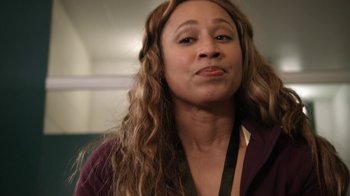 Movie still from “16 Wishes” (2010), directed by Peter DeLuise – A person with long curly hair; Close Up shot, Over the shoulder angle