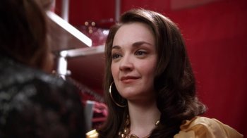 Movie still from “16 Wishes” (2010), directed by Peter DeLuise – A person with long hair; Close Up shot, Over the shoulder angle
