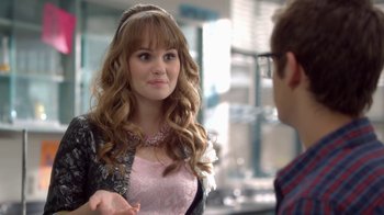 Movie still from “16 Wishes” (2010), directed by Peter DeLuise – A young woman talking to a young man in front of a building; Close Up shot, Over the shoulder angle