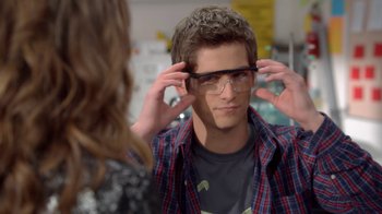 Movie still from “16 Wishes” (2010), directed by Peter DeLuise – A young man adjusting his glasses in front of a mirror; Close Up shot, Over the shoulder angle