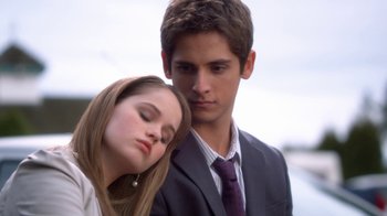 Movie still from “16 Wishes” (2010), directed by Peter DeLuise – A man and a woman standing next to each other; Close Up shot, Low angle