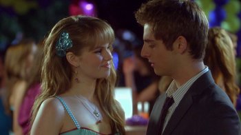 Movie still from “16 Wishes” (2010), directed by Peter DeLuise – A man and a woman are looking at one another; Close Up shot, Over the shoulder angle