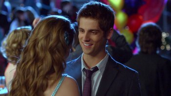 Movie still from “16 Wishes” (2010), directed by Peter DeLuise – A man and a woman are smiling at each other; Close Up shot, Over the shoulder angle