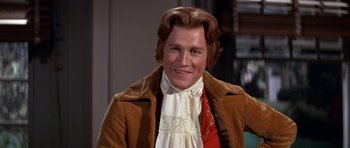 Movie still from “1776” (1972), directed by Peter H. Hunt – A person wearing a suit and tie; Close Up shot, Over the shoulder angle