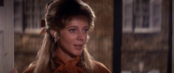 Movie still from “1776” (1972), directed by Peter H. Hunt – A person with long hair; Close Up shot, Over the shoulder angle