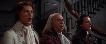 Movie still from “1776” (1972), directed by Peter H. Hunt – Two men dressed up as a man and a woman; Close Up shot, High angle