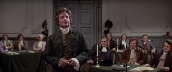 Movie still from “1776” (1972), directed by Peter H. Hunt – A group of people sitting in a room; Medium shot, Over the shoulder angle