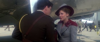 Movie still from “1941” (1979), directed by Steven Spielberg – A man and a woman are talking on a bus; Close Up shot, Over the shoulder angle