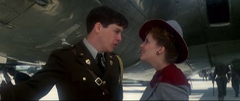 Movie still from “1941” (1979), directed by Steven Spielberg – A man and a woman in military uniforms looking at one another; Close Up shot, Low angle