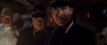 Movie still from “1941” (1979), directed by Steven Spielberg – A man in a hat and a man in a uniform; Close Up shot, Low angle