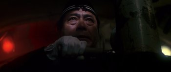 Movie still from “1941” (1979), directed by Steven Spielberg – A person holding a baseball bat; Close Up shot, Low angle