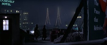 Movie still from “1941” (1979), directed by Steven Spielberg – A couple of people are standing in the dark; Extreme Wide shot, Low angle