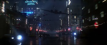 Movie still from “1941” (1979), directed by Steven Spielberg – A view of a city street at night with lights; Extreme Wide shot, Low angle