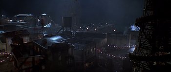 Movie still from “1941” (1979), directed by Steven Spielberg – A view of a city at night from above; Extreme Wide shot, High angle