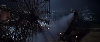 Movie still from “1941” (1979), directed by Steven Spielberg – A large ferris wheel in the middle of the night; Extreme Wide shot, High angle