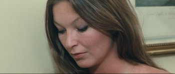 Movie still from “2 or 3 Things I Know About Her” (1967), directed by Jean-Luc Godard – A woman's face with her eyes closed; Close Up shot, High angle