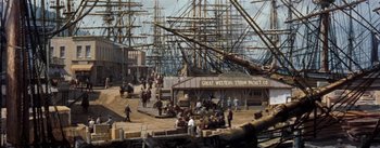 Movie still from “20,000 Leagues Under the Sea” (1954), directed by Richard Fleischer – Many ships in the harbor and people are standing around; Extreme Wide shot, High angle