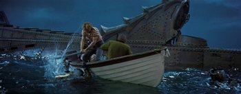 Movie still from “20,000 Leagues Under the Sea” (1954), directed by Richard Fleischer – Two people in a boat in the middle of the ocean; Wide shot, High angle