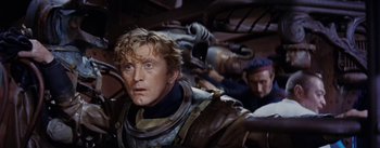 Movie still from “20,000 Leagues Under the Sea” (1954), directed by Richard Fleischer – A person in a space suit; Close Up shot, High angle