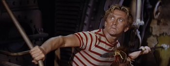 Movie still from “20,000 Leagues Under the Sea” (1954), directed by Richard Fleischer – A person wearing a striped shirt; Medium shot, Low angle